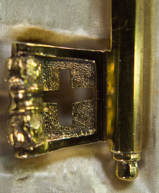 Schlüsselbart und Abschlußsegment am Ende des Schlüsselhalms